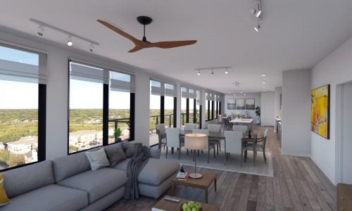 Penthouse living room with large windows and ceiling fan at The Drake