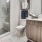 Large bathroom with wood tile and walk in shower at The Drake