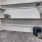 Very large well lit walk in closet with custom shelving in units at The Drake