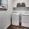 Large laundry areas with full size washer and dryer at The Drake